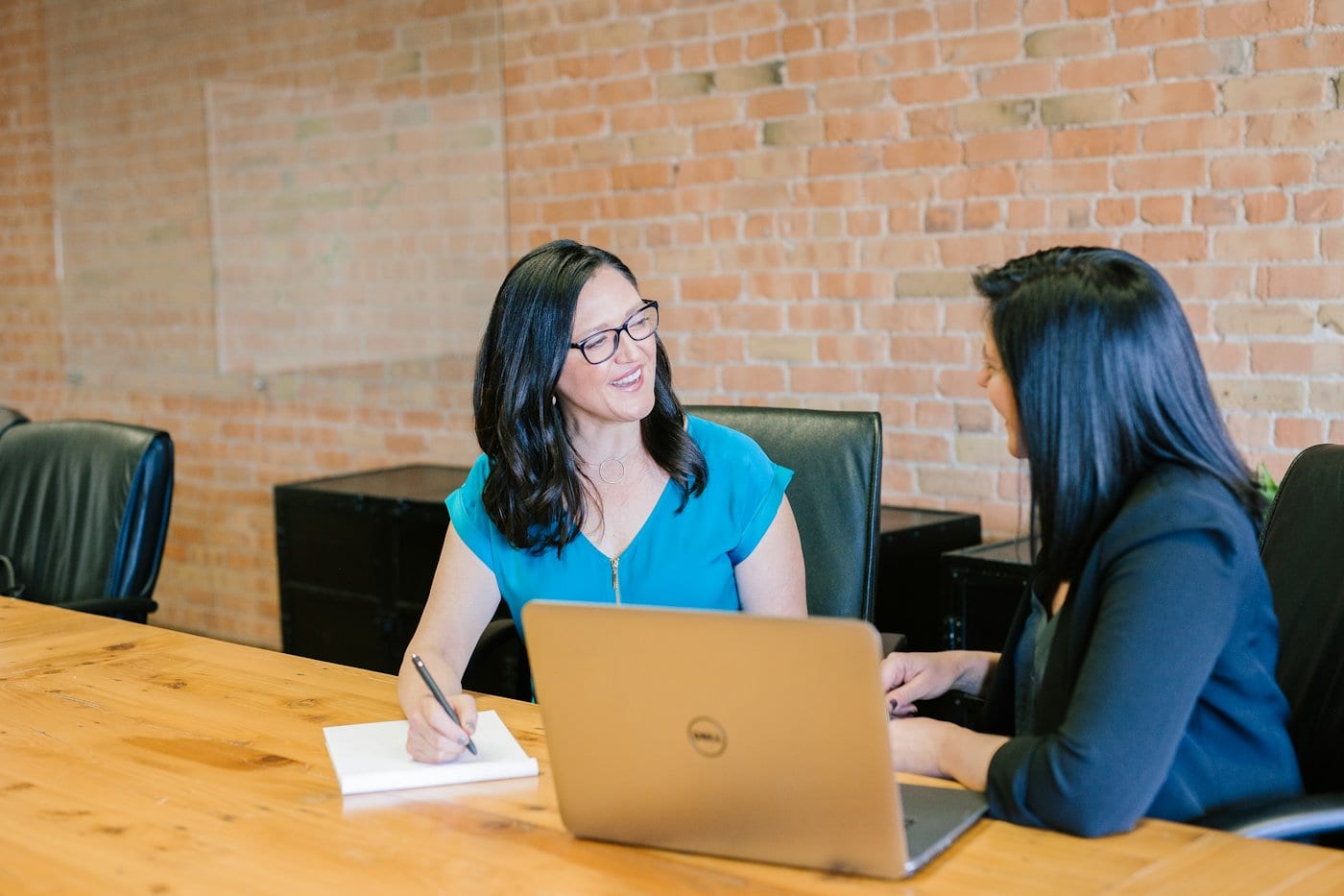 Two people in a one-to-one working session