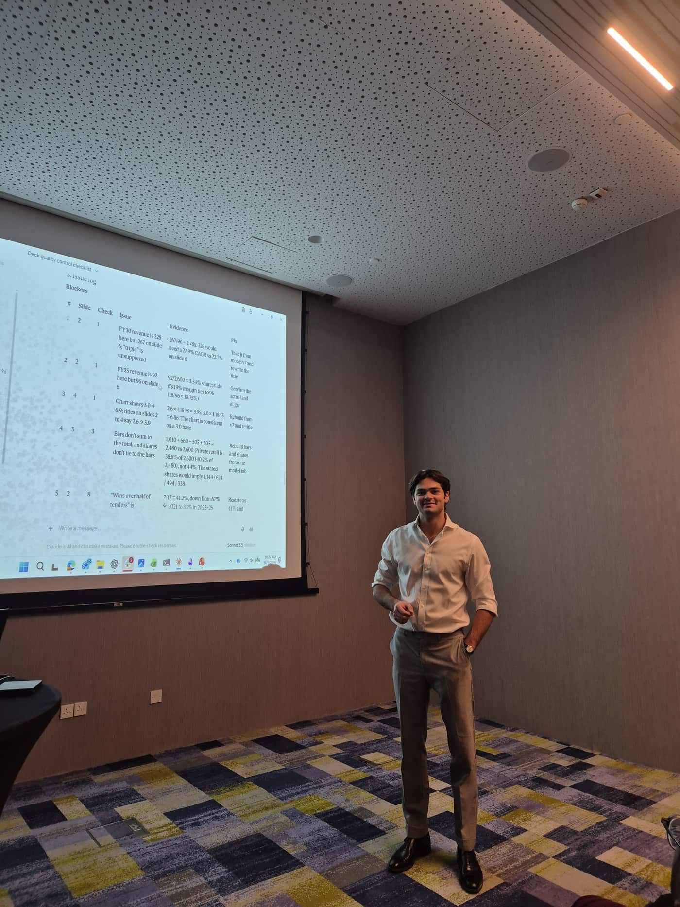 Victor de Chalendar presenting a deck quality control checklist built in Claude to a training room in Dubai